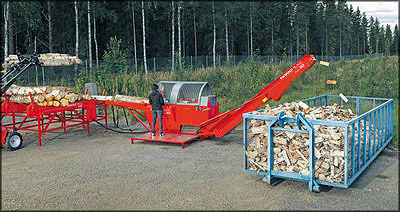 Рис. 1. Финский дровокольный станок со столом подачи и накопителем
